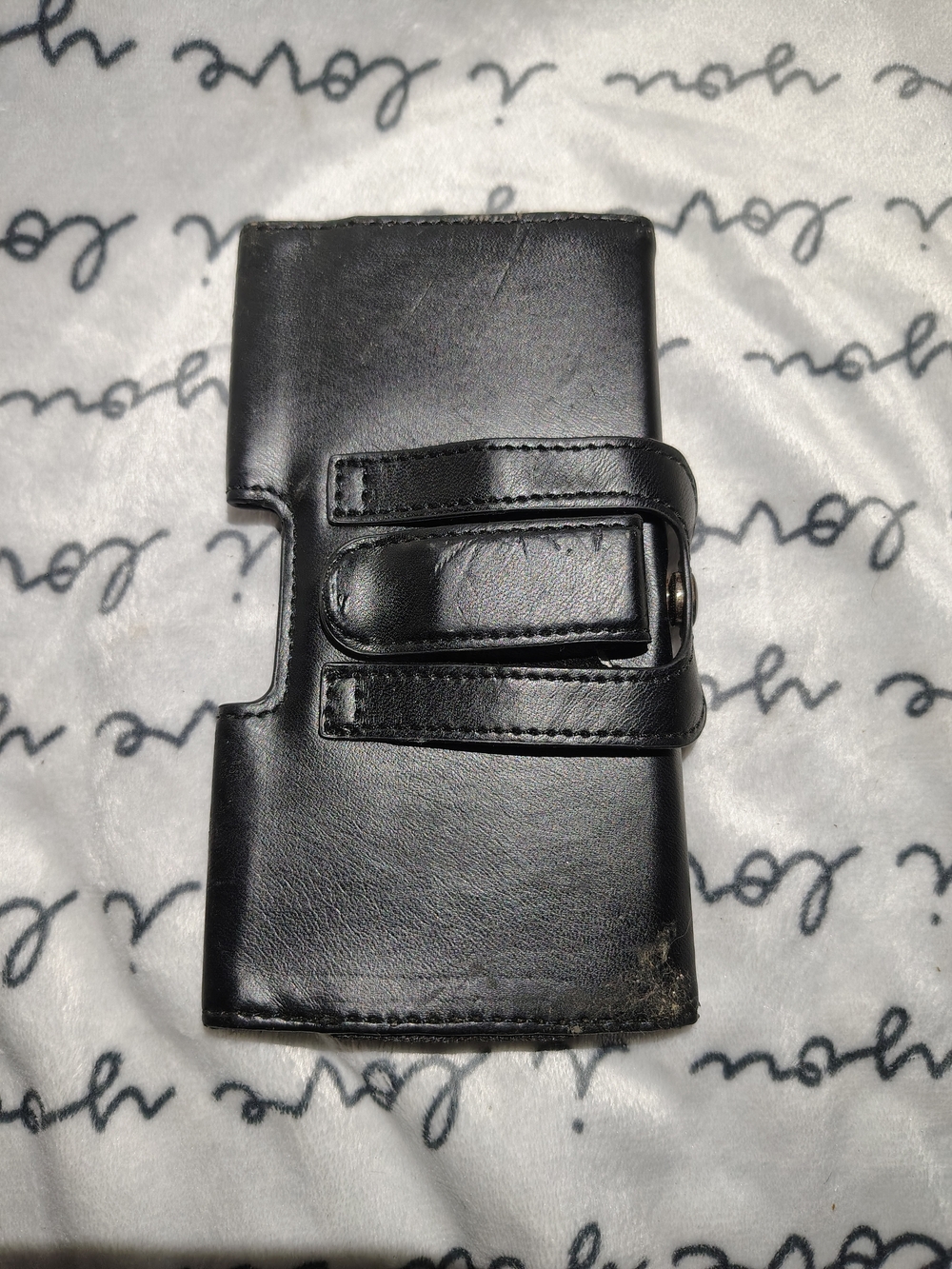 Black Leather Wallet-Style Cell Phone Case with Snap Closure